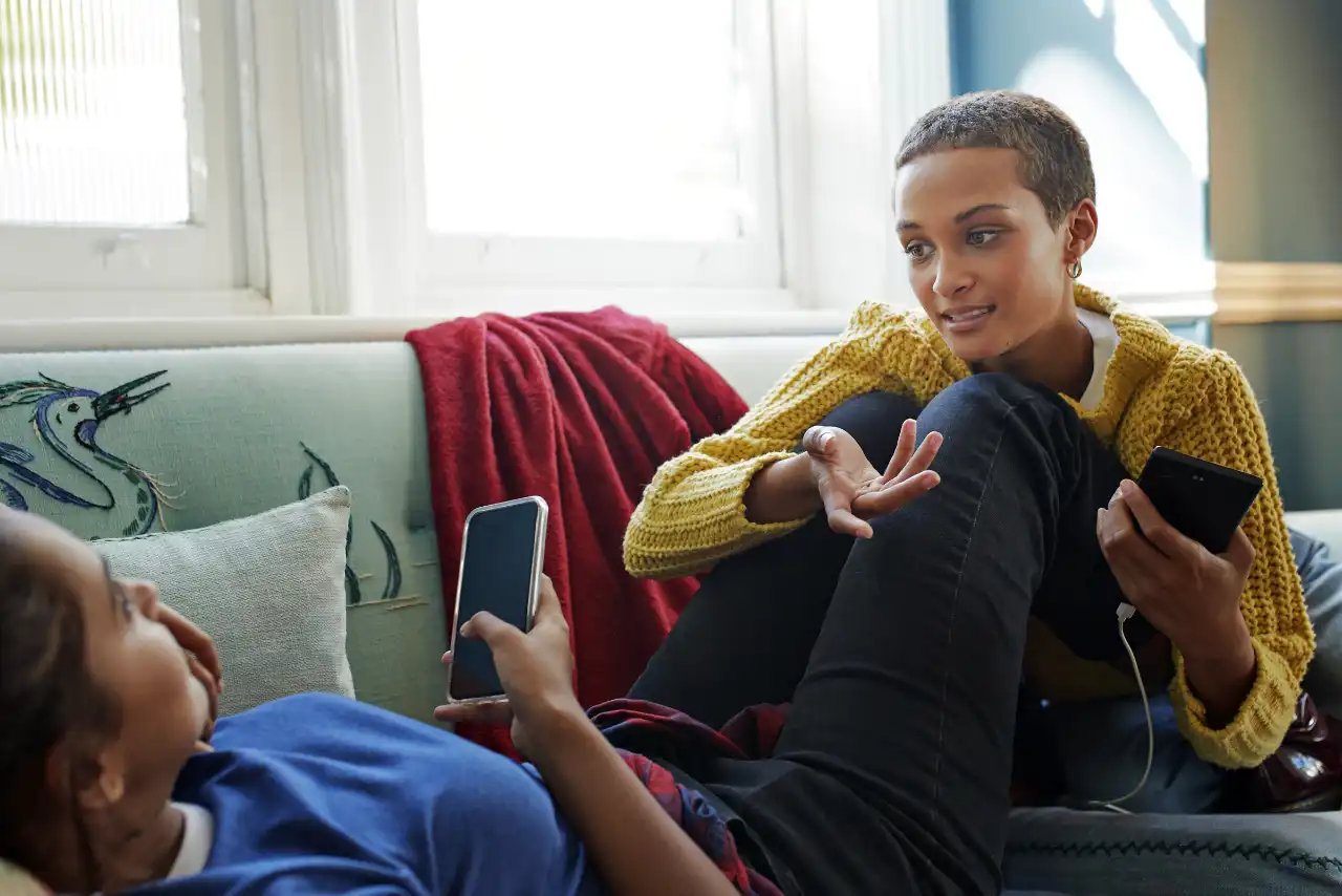 Couple discusses on the sofa